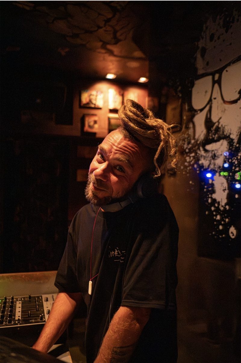 dj mixing behind the decks the dude bar monastiraki